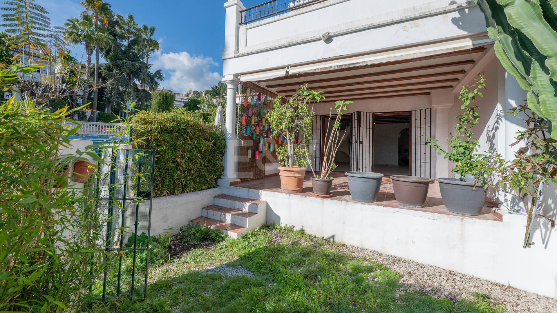 Andalusian Style Townhouse with Private Outdoor Spaces and Outstanding Upgrade Potential