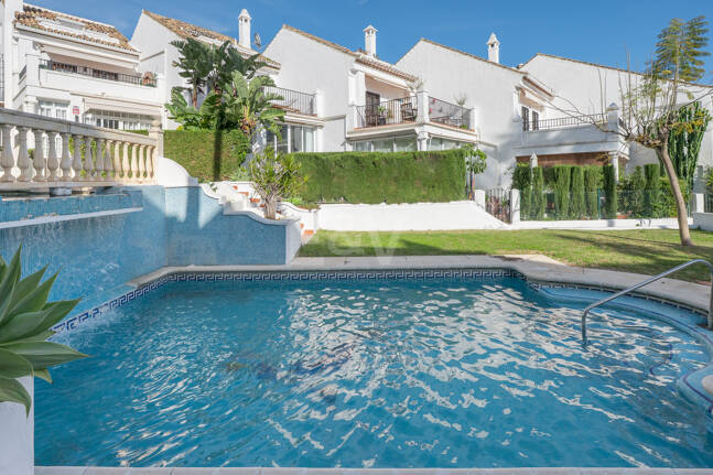 Andalusian Style Townhouse with Private Outdoor Spaces and Outstanding Upgrade Potential