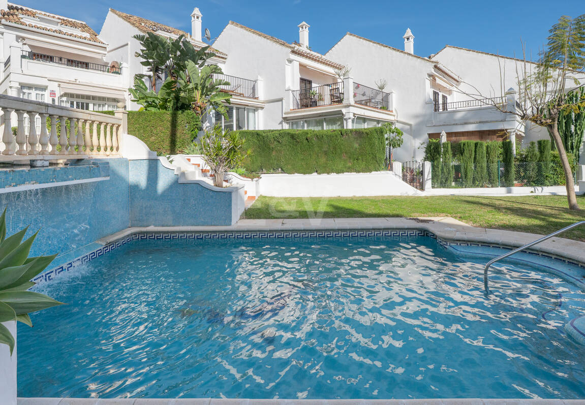 Andalusian Style Townhouse with Private Outdoor Spaces and Outstanding Upgrade Potential