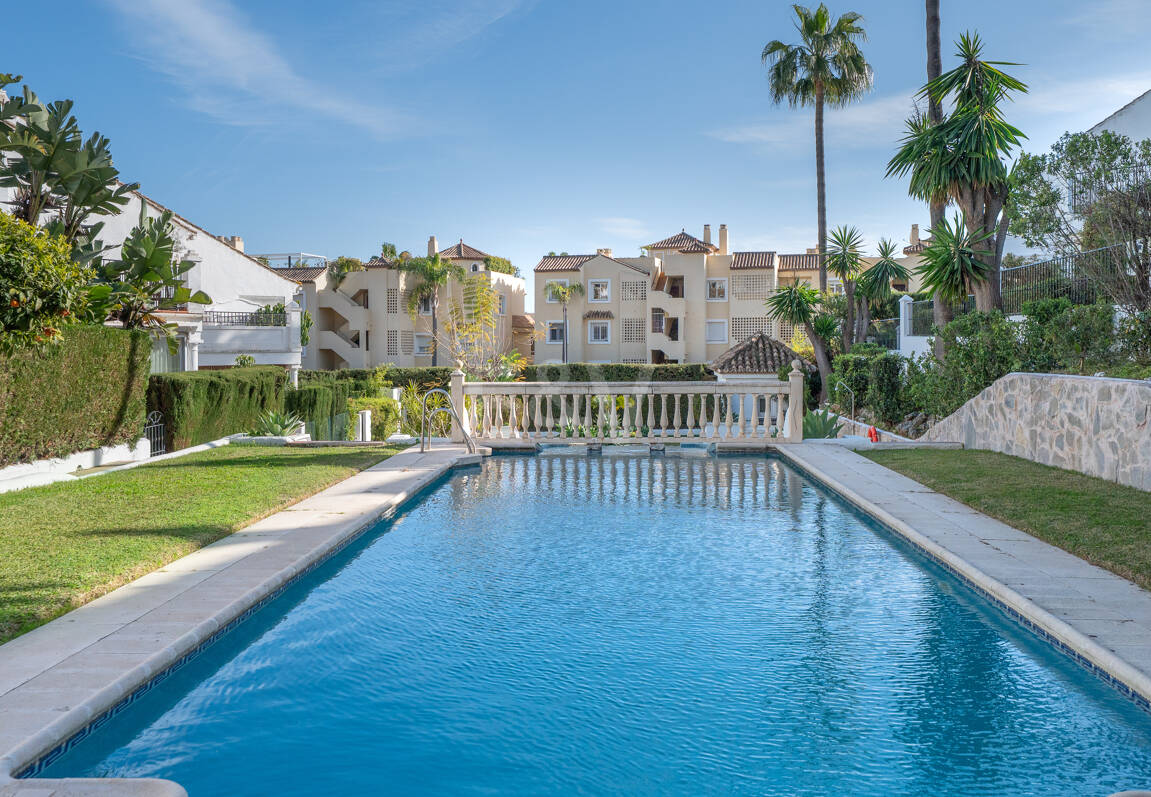 Andalusian Style Townhouse with Private Outdoor Spaces and Outstanding Upgrade Potential