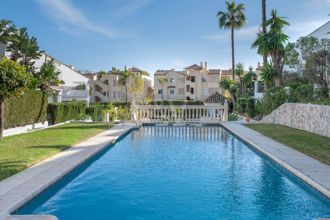 Andalusian Style Townhouse with Private Outdoor Spaces and Outstanding Upgrade Potential