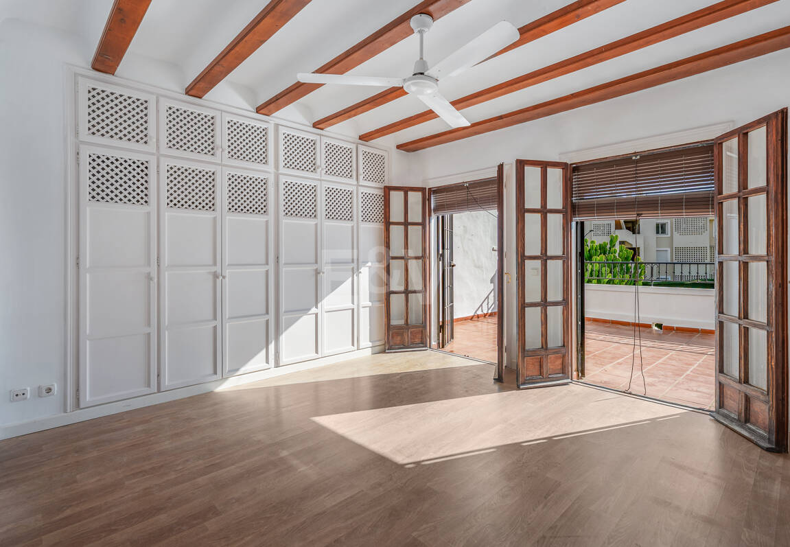 Andalusian Style Townhouse with Private Outdoor Spaces and Outstanding Upgrade Potential