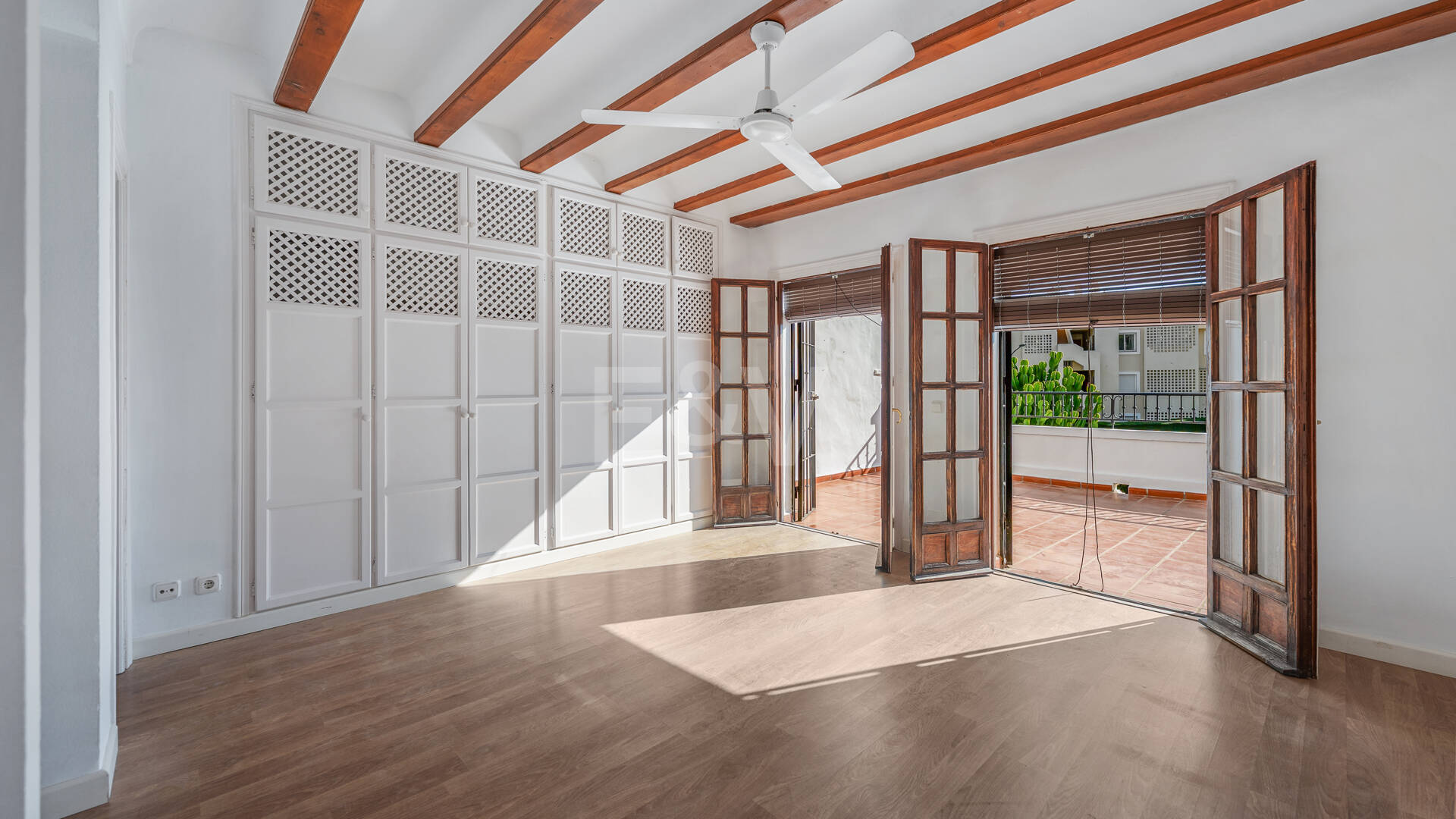 Andalusian Style Townhouse with Private Outdoor Spaces and Outstanding Upgrade Potential