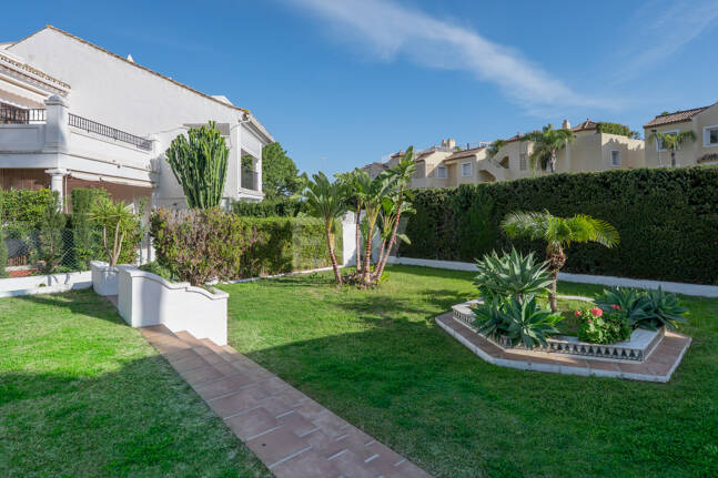 Andalusian Style Townhouse with Private Outdoor Spaces and Outstanding Upgrade Potential
