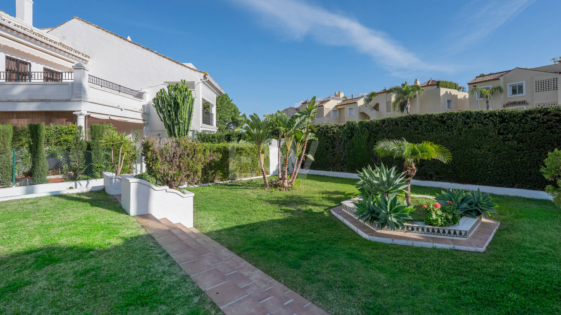 Andalusian Style Townhouse with Private Outdoor Spaces and Outstanding Upgrade Potential