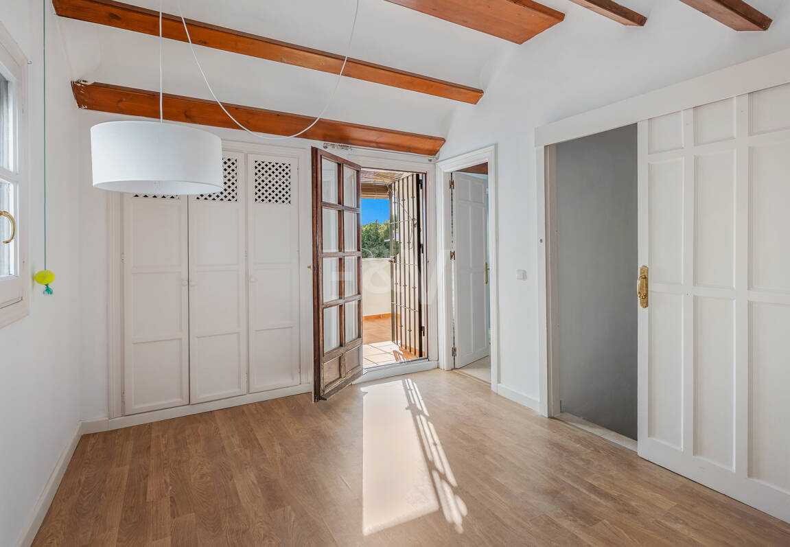 Andalusian Style Townhouse with Private Outdoor Spaces and Outstanding Upgrade Potential