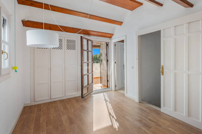 Andalusian Style Townhouse with Private Outdoor Spaces and Outstanding Upgrade Potential