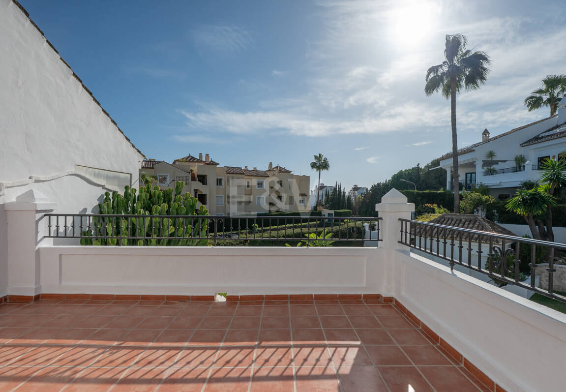 Andalusian Style Townhouse with Private Outdoor Spaces and Outstanding Upgrade Potential