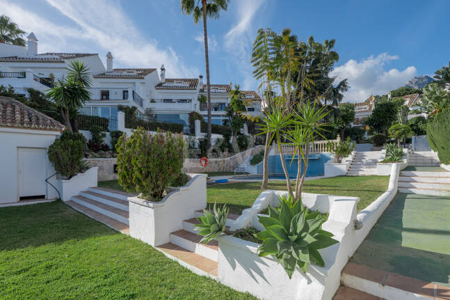 Andalusian Style Townhouse with Private Outdoor Spaces and Outstanding Upgrade Potential