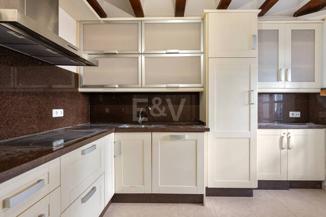 Andalusian Style Townhouse with Private Outdoor Spaces and Outstanding Upgrade Potential