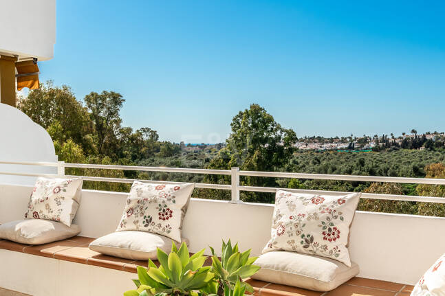 Elegant Frontline Golf Apartment with Expansive Terrace