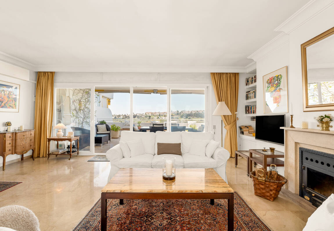 Elegant Frontline Golf Apartment with Expansive Terrace