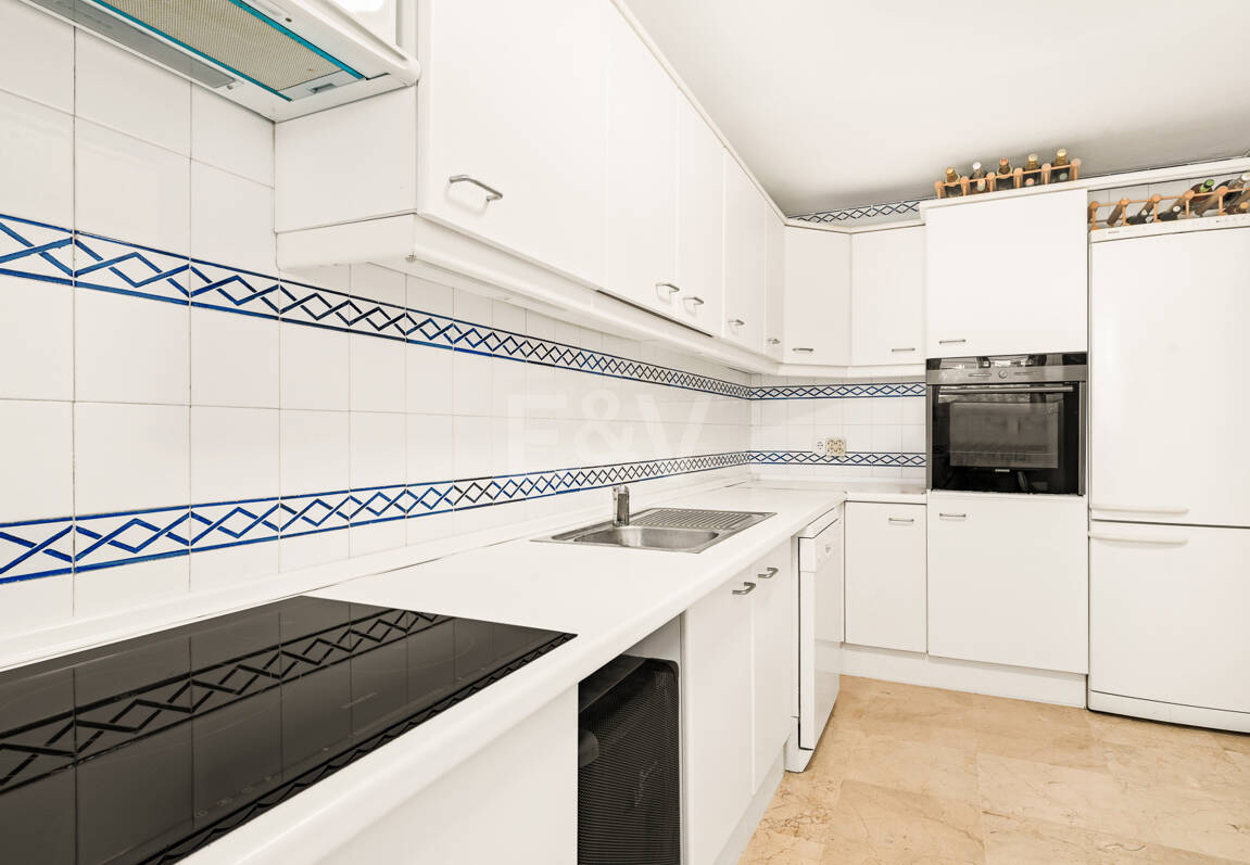 Elegant Frontline Golf Apartment with Expansive Terrace