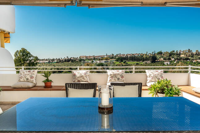 Elegant Frontline Golf Apartment with Expansive Terrace