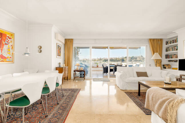 Elegant Frontline Golf Apartment with Expansive Terrace