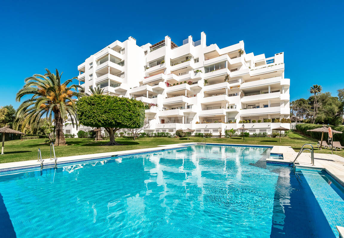 Elegant Frontline Golf Apartment with Expansive Terrace