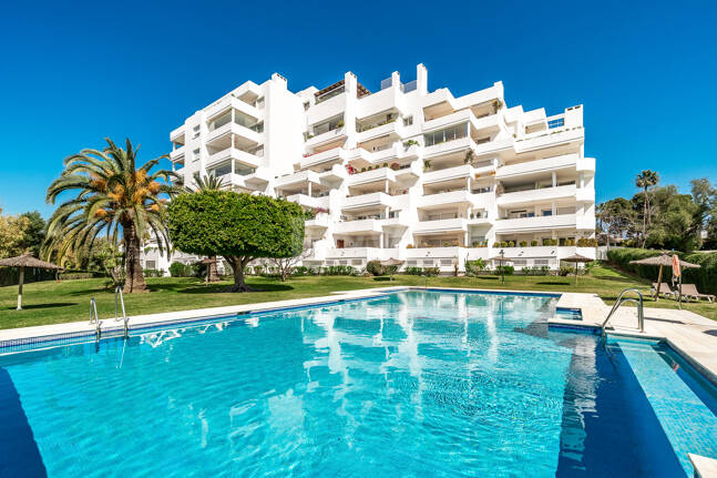 Elegant Frontline Golf Apartment with Expansive Terrace