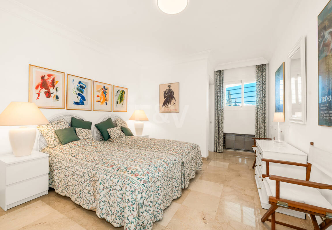 Elegant Frontline Golf Apartment with Expansive Terrace