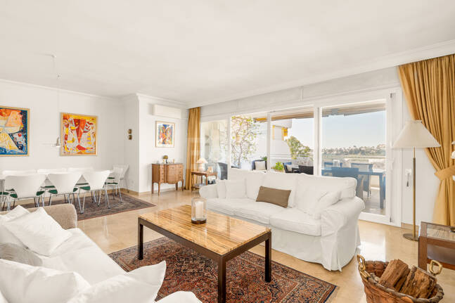 Elegant Frontline Golf Apartment with Expansive Terrace