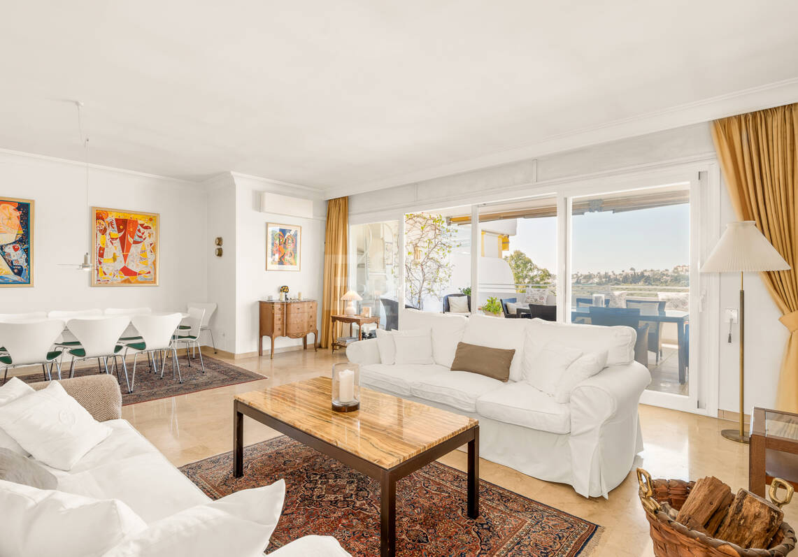 Elegant Frontline Golf Apartment with Expansive Terrace
