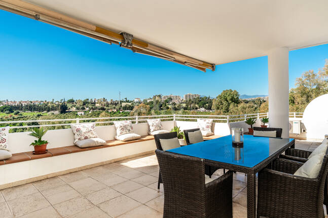 Elegant Frontline Golf Apartment with Expansive Terrace