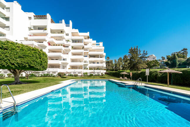 Elegant Frontline Golf Apartment with Expansive Terrace