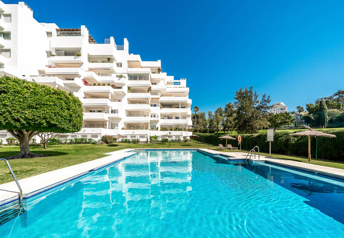 Elegant Frontline Golf Apartment with Expansive Terrace