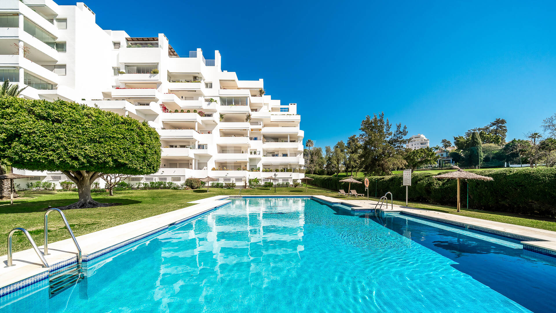 Elegant Frontline Golf Apartment with Expansive Terrace