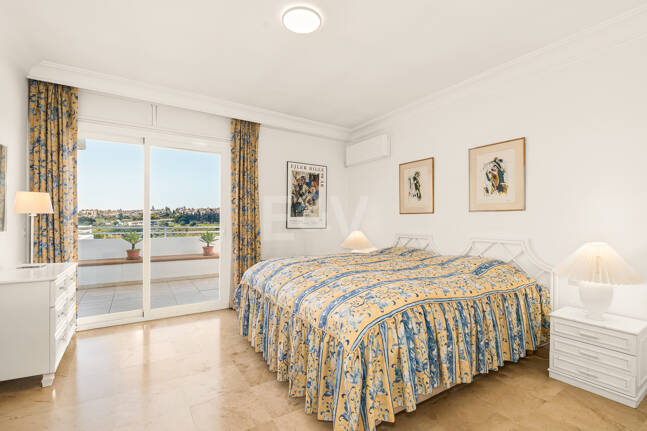 Elegant Frontline Golf Apartment with Expansive Terrace