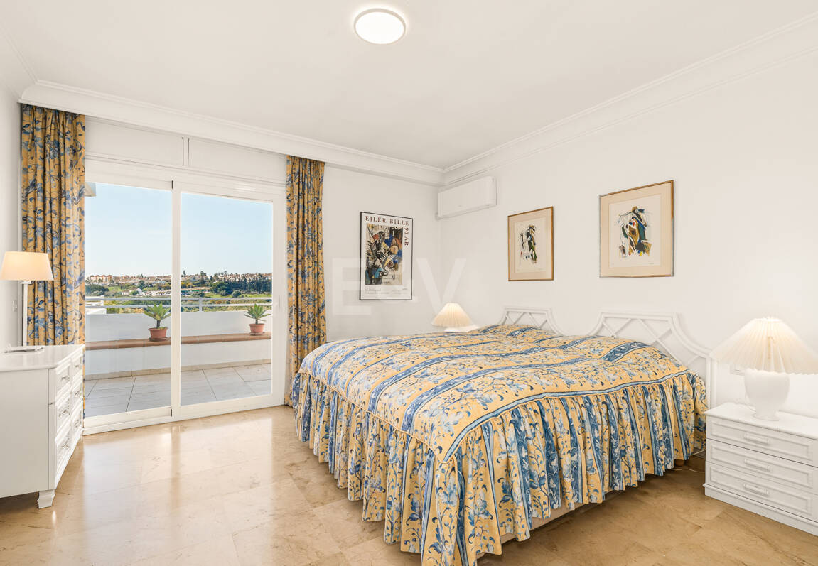 Elegant Frontline Golf Apartment with Expansive Terrace