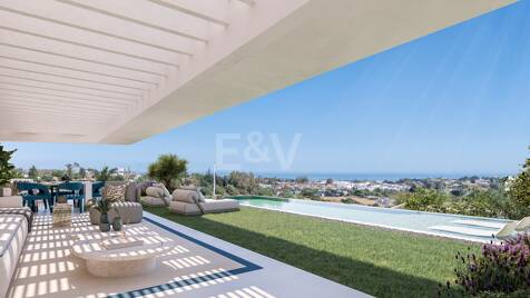 Apartamento en Jardín con Vistas Panorámicas al Mar y Montaña en una Urbanización de Lujo