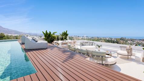 Ático de nueva construcción con terrazas con vistas al mar, nivel de ocio privado en la azotea y servicios estilo resort