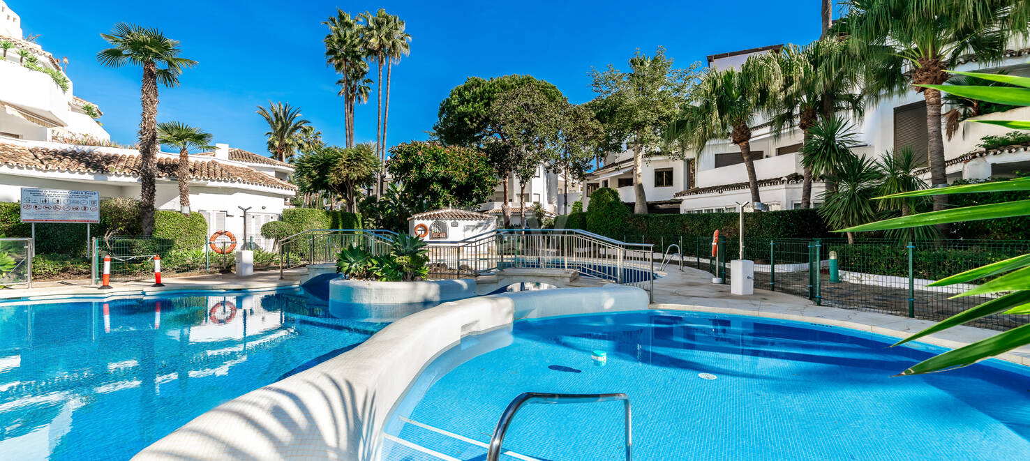 Beachfront Apartment with Tropical Gardens and Direct Sea Access