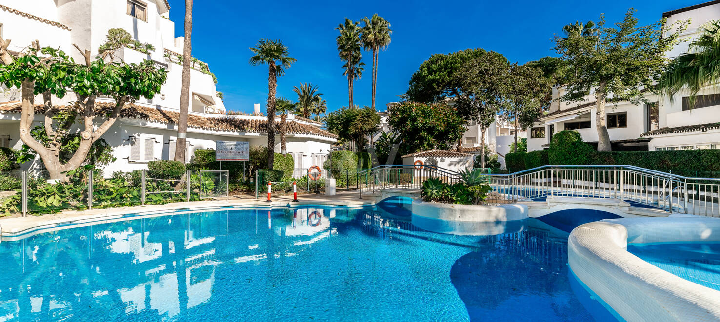 Beachfront Apartment with Tropical Gardens and Direct Sea Access