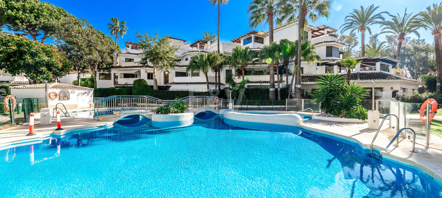 Beachfront Apartment with Tropical Gardens and Direct Sea Access