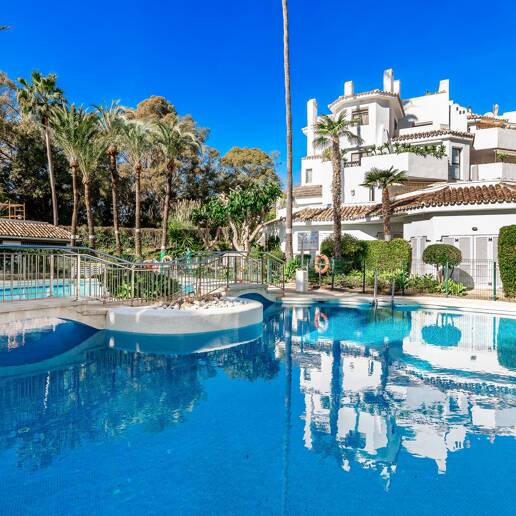 Beachfront Apartment with Tropical Gardens and Direct Sea Access