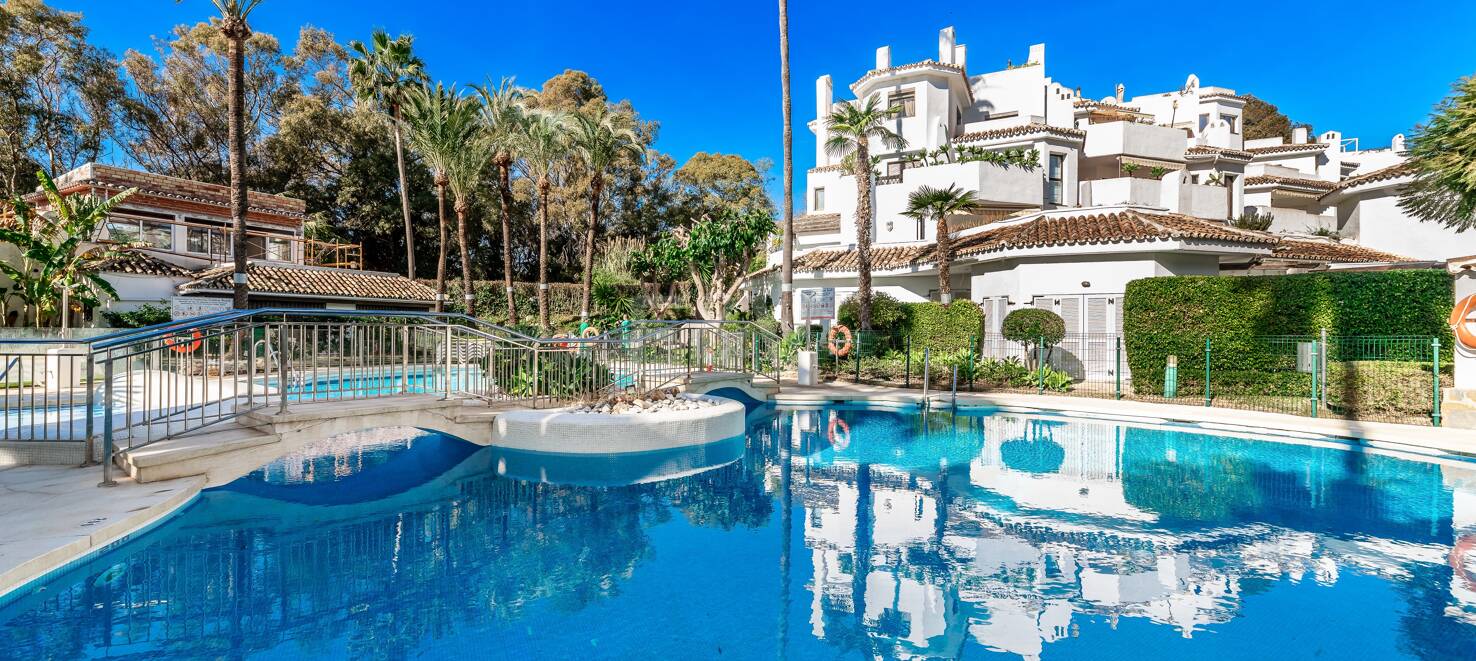 Beachfront Apartment with Tropical Gardens and Direct Sea Access