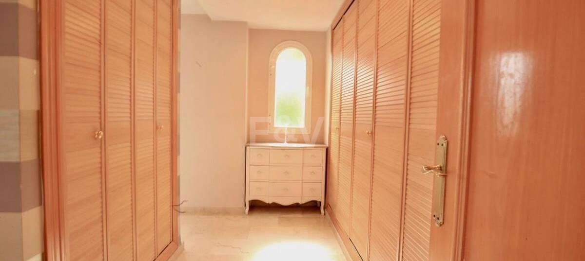 Family Villa with Garden and Pool in Prestigious Guadalmina Golf close to Amenities