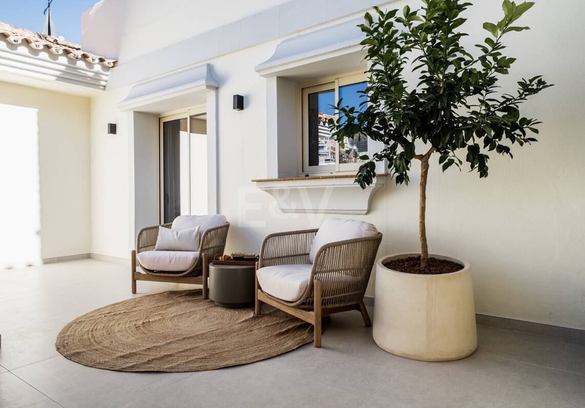 Elegant duplex penthouse in La Cerquilla with spectacular mountain views
