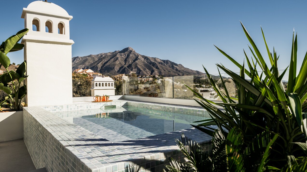 Elegante ático dúplex en La Cerquilla con vistas espectaculares a la montaña