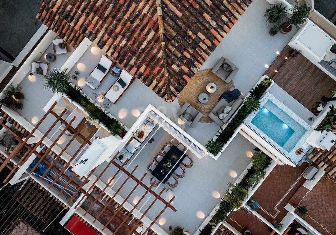 Elegant duplex penthouse in La Cerquilla with spectacular mountain views
