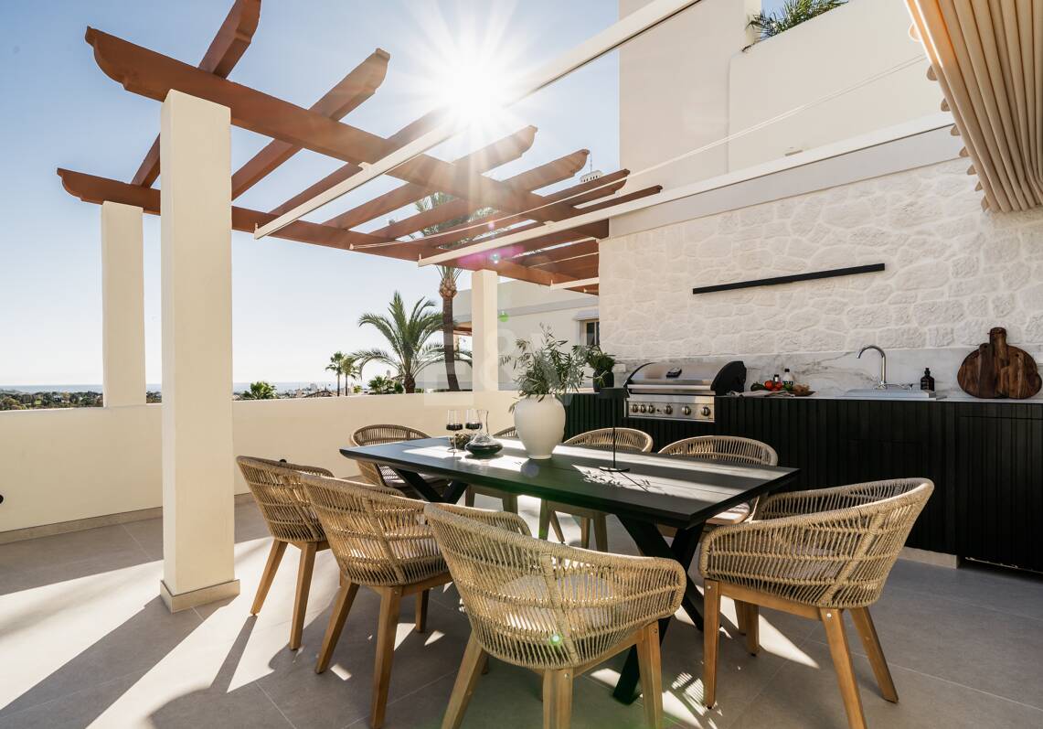 Elegant duplex penthouse in La Cerquilla with spectacular mountain views