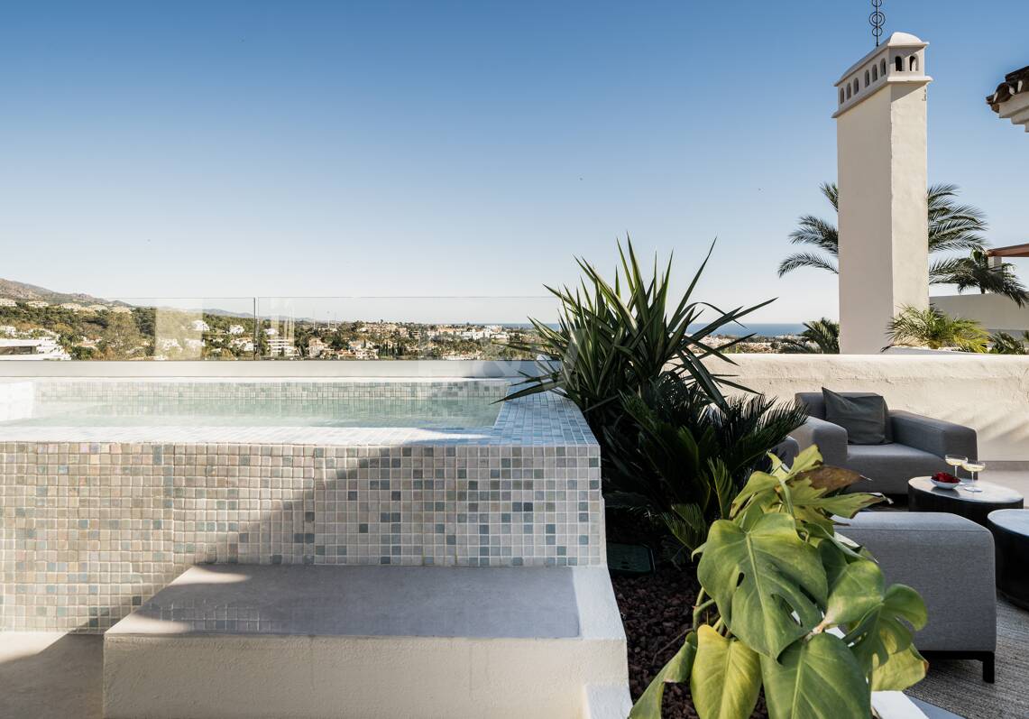 Elegant duplex penthouse in La Cerquilla with spectacular mountain views