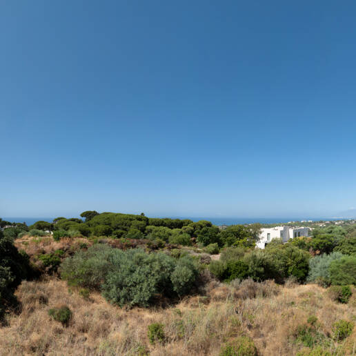 Grundstück in bester Lage mit Projekt für eine moderne Villa mit Meerblick