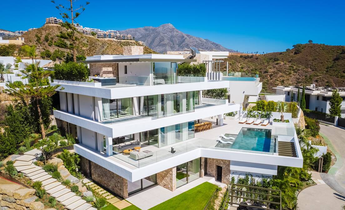 A masterpiece of modern luxury with exceptional sea and golf views