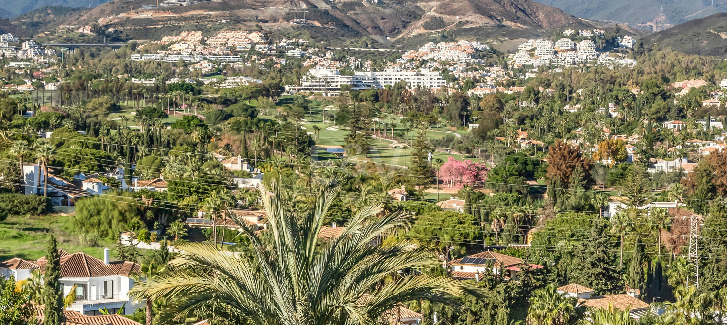 Utsökt takvåning med hisnande utsikt i Nueva Andalucía