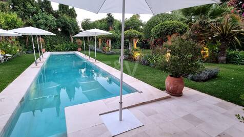 Villa élégante et traditionnelle près du golf, à distance de marche de la plage