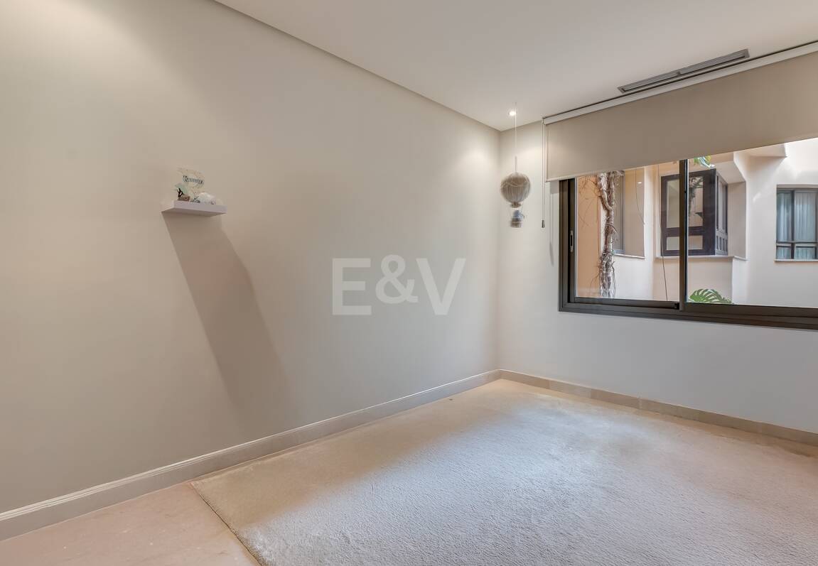 Sophisticated Garden Apartment in the Exclusive Mansion Club Community