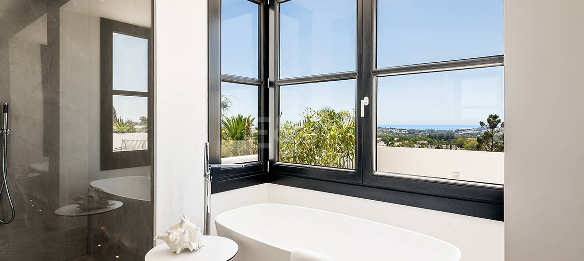 Impressive Villa in La Cerquilla with Panoramic Sea Views