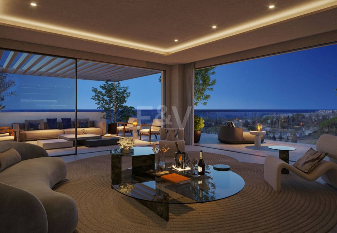 An Exceptional Duplex Penthouse with Sweeping Views Moments from the Beach